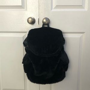 black fuzzy backpack
